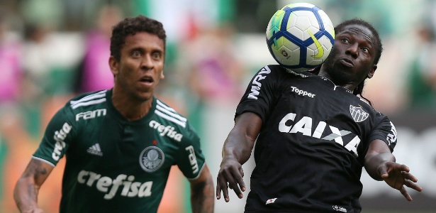 Marcos Rocha, do Palmeiras, marca Yimmi Chara, do Atlético-MG
