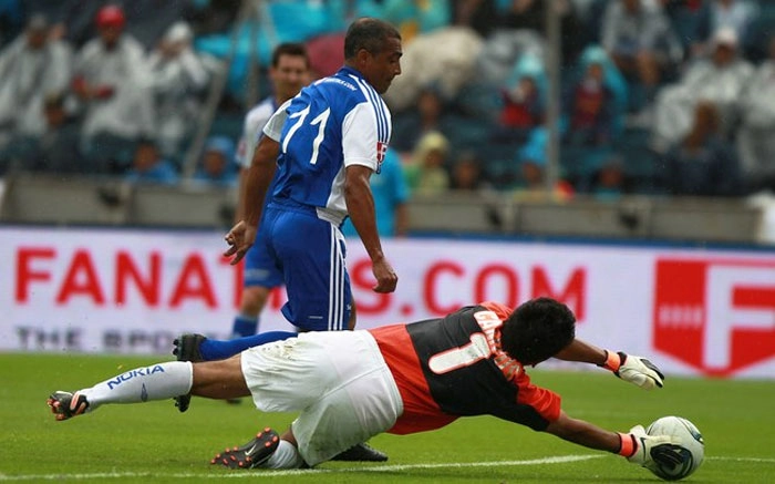 Romário jogou no time do Messi e deixou sua marca na partida. Foto: iG/AP