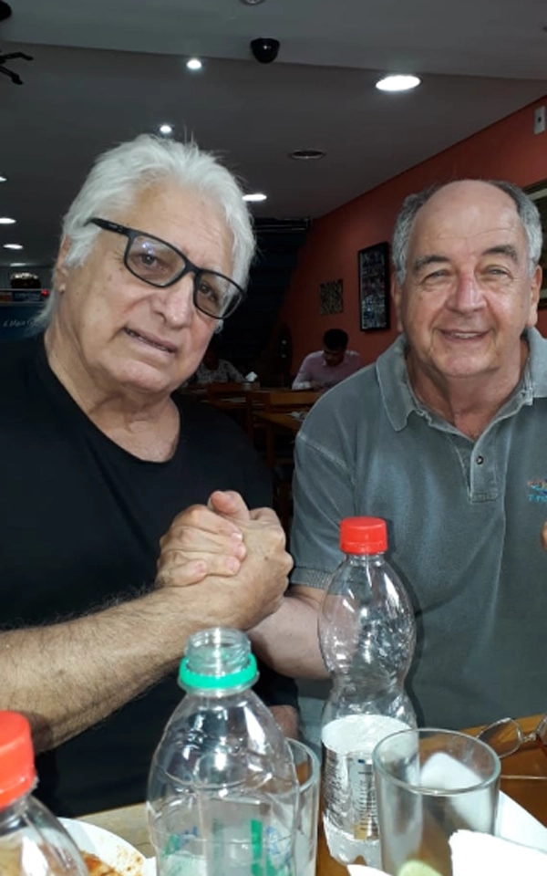 Marinho Peres (de camisa preta) e Marcos Falopa, em março de 2019