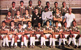 Foto do Fluminense de 1970 enviada pelo internauta Walter Peres. Na primeira fila, de cima para baixo, vemos jogador não identificado, Galhardo, Denílson, Paulo Lumumba, Toninho, Assis e jogador não identificado; na fila do meio estão Oliveira, jogador não identificado, Cláudio Garcia, Jorge Vitório, Jairo, Silveira e Paulo Amaral; agachados Wilton, Mickey, Didi, jogador não identificado, Jair, Lula, jogador não identificado, Cafuringa e Flávio